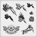 Set of tattoo salon labels, badges and design elements. Tattoo studio emblems with professional equipment.