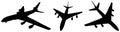 Vector set of three flying black passenger jetliner or commercial planes, isolated on white background Royalty Free Stock Photo