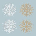 Vector set of white and gold snowflakes isolated on blue Royalty Free Stock Photo