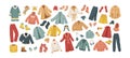 The vector set of winter clothes. Coats, hats, gloves, shoes and socks