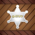 Vector Sheriff's badge on a wooden background. Royalty Free Stock Photo