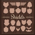 Vector Shields Set on wooden background Royalty Free Stock Photo