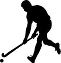 Vector silhouette of field hockey player with a hockey stick Royalty Free Stock Photo