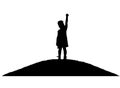 Vector silhouette, little happy baby girl standing on a hill with a raised hand up Royalty Free Stock Photo