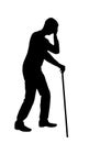 Vector silhouette of a sad disabled man with a cane in his hand