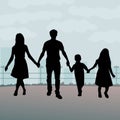 Family silhouettes.A silhouetted illustration of a young family together holding hands.
