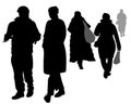 Vector silhouettes of pedestrians. People go back and forth, a guy is talking to a girl, gesturing with his hands, women with bags