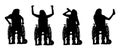 Vector silhouettes of people in a wheelchair. Royalty Free Stock Photo