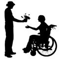 Vector silhouettes of people in a wheelchair. Royalty Free Stock Photo