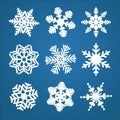 Vector snowflakes winter set of white isolated icon silhouettes on blue background Royalty Free Stock Photo