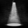 Vector spotlight illuminated scene and brick wall. Glow effect background. Stage decoration with floodlight lamp Royalty Free Stock Photo