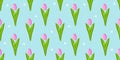 Vector spring tulips flower seamless pattern. Springtime pink tulips on blue background. Floral wallpaper, print