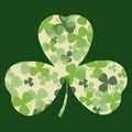 Vector St Patrick's day card. Green and white clover leaves on clover leaf shape and dark background