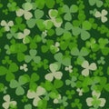 Vector St Patrick's day seamless pattern. Green and white clover leaves on dark background.