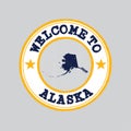 Vector Stamp of welcome to Alaska with states flag on map outline in the center Royalty Free Stock Photo