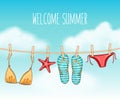 Summer background with swimsuit and flip flops on clothesline