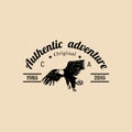 Vector tribal camp logo.Tourist sign with hand drawn image of american eagle.Retro hipster emblem of outdoor adventures.