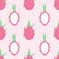 Vector tropical seamless pattern with dragon fruit on the pink dotted background. Hand drawn