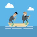 Businessmen are working in a team in the same boat Royalty Free Stock Photo