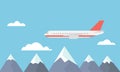 Vector view of a large and fast airliner flying over the mountains between clouds on a blue sky Royalty Free Stock Photo