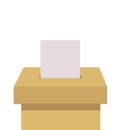 Voter ballot going into a ballot box