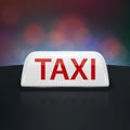 Vector White Taxi Car Sign with Red Text Closeup on the Black Roof, Blurred City Colorful Background. French White Taxi