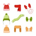 Vector winter clothes set. Cartoon knitted scarf, hat, mittens, gloves isolated on white background. Seasonal winter Royalty Free Stock Photo