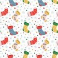 Vector winter holiday seamless pattern with colorful Christmas stockings Royalty Free Stock Photo