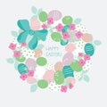 Vector wreath of eggs,flowers and ribbon