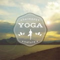 Vector yoga illustration. Name of yoga studio on a blurred sea background.