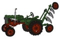 The retro green tractor with a plough