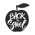 Vectro illustration: Hand drawn type lettering of Back to School and apple on white background. Royalty Free Stock Photo