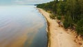 Veczemju Cliffs Red Rocks, Latvia. Red Sandstone Cliff by the Baltic Sea Coast of Vidzeme Royalty Free Stock Photo