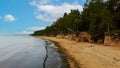 Veczemju Cliffs Red Rocks, Latvia. Red Sandstone Cliff by the Baltic Sea Coast of Vidzeme Royalty Free Stock Photo