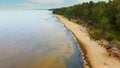 Veczemju Cliffs Red Rocks, Latvia. Red Sandstone Cliff by the Baltic Sea Coast of Vidzeme Royalty Free Stock Photo