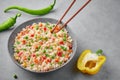 Veg Fried Rice in gray bowl on concrete table top. Veg Fried rice is indo chinese cuisine dish. Indian vegetarian meal Royalty Free Stock Photo