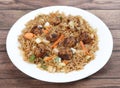 Veg manchurian fried rice, made of fried mixed vegetables balls along with rice is tossed in soy tomato based sauce, indo chinese Royalty Free Stock Photo