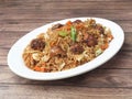 Veg manchurian fried rice, made of fried mixed vegetables balls along with rice is tossed in soy tomato based sauce, indo chinese Royalty Free Stock Photo