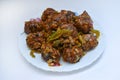 Veg Manchurian with gravy - Popular food of India made of cauliflower florets and vegetables
