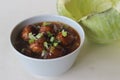 Veg Manchurian. An Indo Chinese dish with fried vegetables balls in a spicy, sweet and tangy sauce. It is made of cabbage, carrot Royalty Free Stock Photo