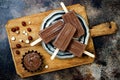 Vegan banana chocolate fudge popsicles with homemade hazelnut spread. Creamy dairy free ice pops, nicecream, fudgesicles.