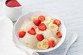 Vegan banana ice cream with strawberry sauce and fresh strawberries Royalty Free Stock Photo