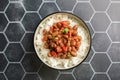 Vegan bean curry with rice and tomatoes. Indian cuisine. Vegetarian dish.