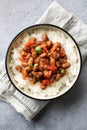 Vegan bean curry with rice and tomatoes. Indian cuisine. Vegetarian dish.