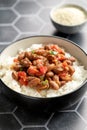 Vegan bean curry with rice and tomatoes. Indian cuisine. Vegetarian dish.