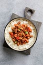 Vegan bean curry with rice and tomatoes. Indian cuisine. Vegetarian dish.