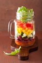 Vegan bean vegetable salad in mason jar