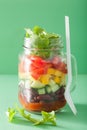 Vegan bean vegetable salad in mason jars