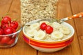 Vegan breakfast with oatmeal porridge and cherries