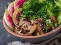 Vegan buddha bowl dinner food table. Healthy vegan lunch bowl. Grilled mushrooms, broccoli, radish salad Royalty Free Stock Photo